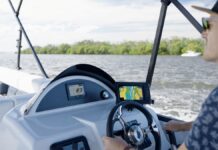 River Fishing in Queensland? What To Know Before You Go River fishing on a pontoon boat. Image by Lagee Aquatic.